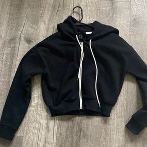 Size medium women, black zipper half hoodie sweater.  Only worn once excellent